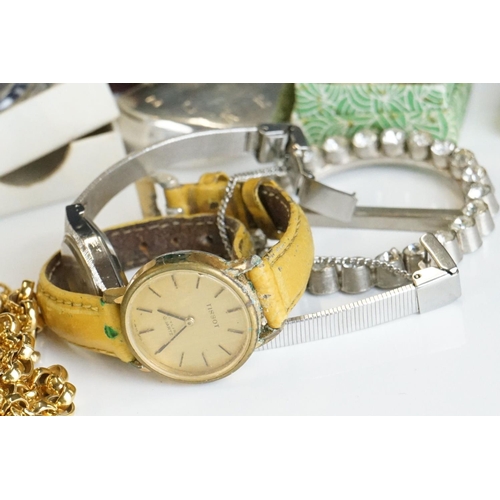 319 - A small collection of watches and vintage costume jewellery to include gold and silver examples.