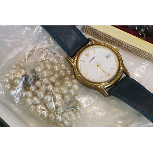 319 - A small collection of watches and vintage costume jewellery to include gold and silver examples.