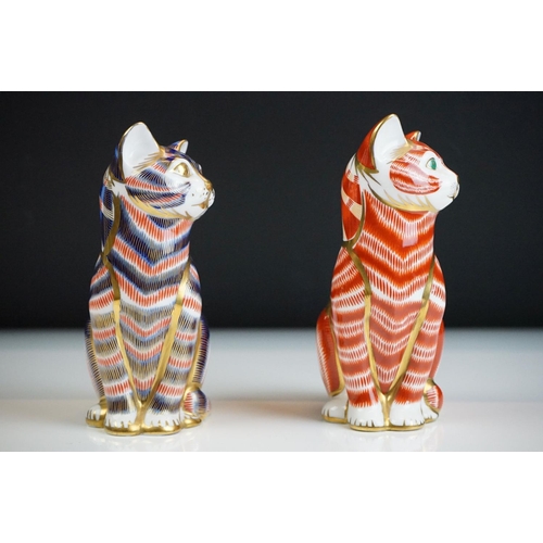 54 - Two Royal Crown Derby paperweights modelled as seated cats, to include a Ginger cat example (13cm hi... 