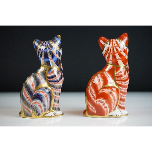 54 - Two Royal Crown Derby paperweights modelled as seated cats, to include a Ginger cat example (13cm hi... 