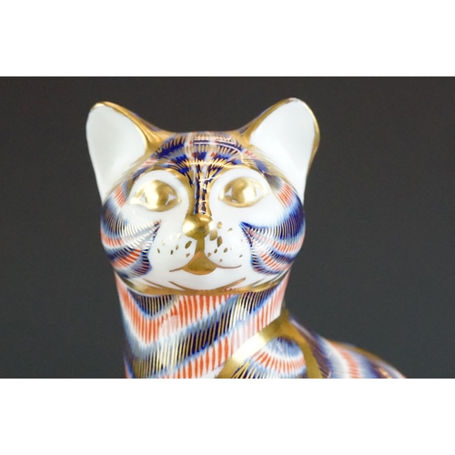 54 - Two Royal Crown Derby paperweights modelled as seated cats, to include a Ginger cat example (13cm hi... 