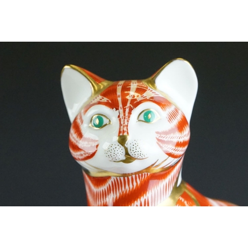 54 - Two Royal Crown Derby paperweights modelled as seated cats, to include a Ginger cat example (13cm hi... 