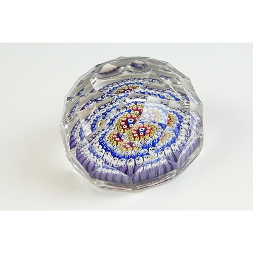 55 - Six Whitefriars faceted glass concentric millefiori paperweights, of varying colours, to include an ... 