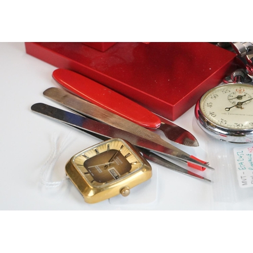 321 - A collection of watch repair tools together with a small group of ladies and gents watches to includ... 