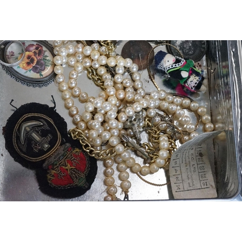 322 - A box of mixed collectables to include a hallmarked sterling silver ingot pendant ad necklace, coins... 