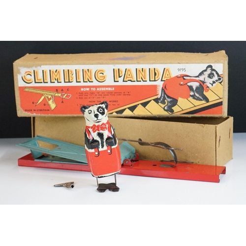 325 - A vintage Climbing Panda tin plate toy in original box.