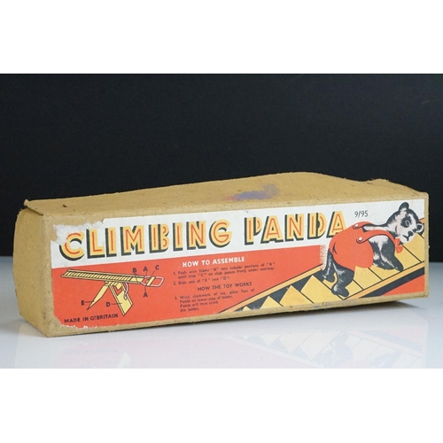 325 - A vintage Climbing Panda tin plate toy in original box.