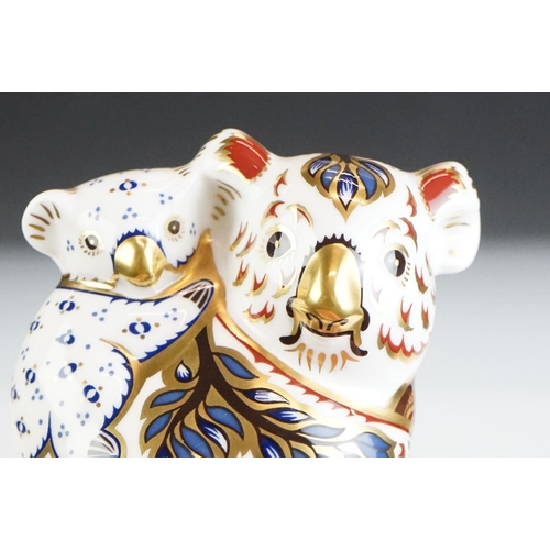 58 - Two Royal Crown Derby paperweights to include an Australian Collection Kangaroo (15cm high) and a Ko... 