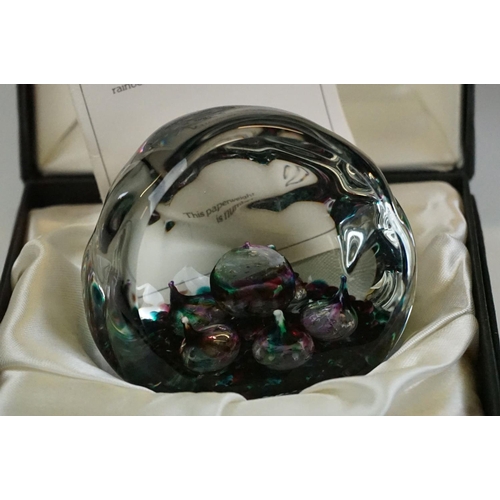 61 - Six glass paperweights to include a John Deacons faceted lamp work pansy & millefiori paperweight (w... 