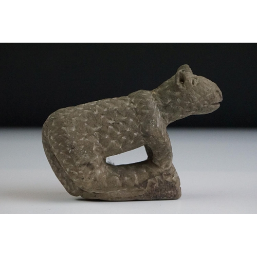 65 - Rustic pottery figure of a cat, in the antique style, with carved effect to surface, 12cm long