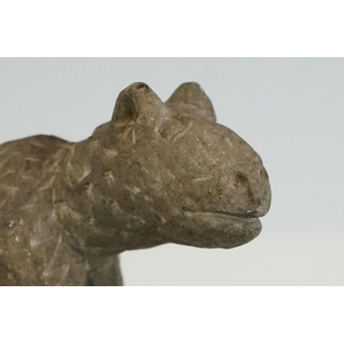 65 - Rustic pottery figure of a cat, in the antique style, with carved effect to surface, 12cm long