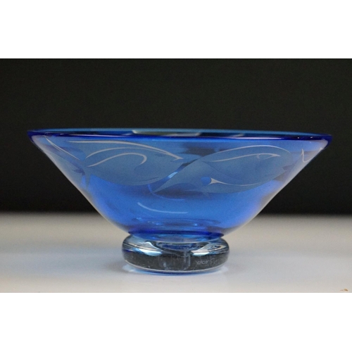 71 - Julia Linstead - Blue overlay studio glass bowl with engraved / etched fish decoration, raised on a ... 