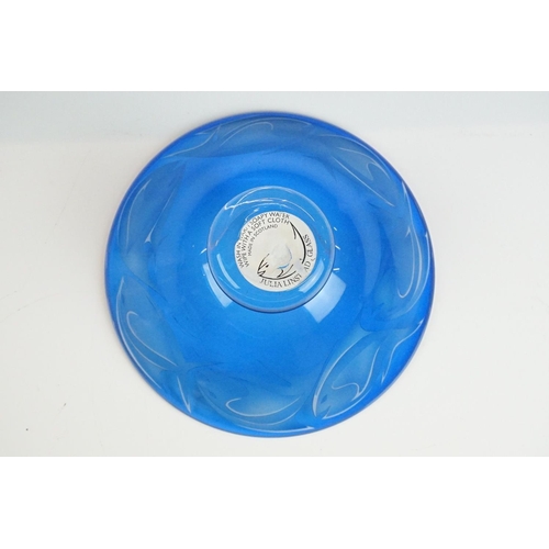 71 - Julia Linstead - Blue overlay studio glass bowl with engraved / etched fish decoration, raised on a ... 