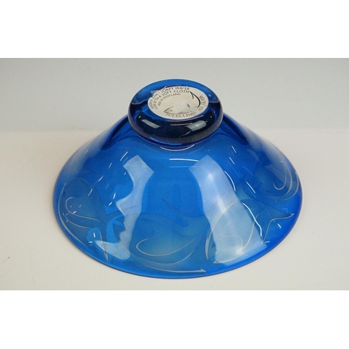 71 - Julia Linstead - Blue overlay studio glass bowl with engraved / etched fish decoration, raised on a ... 