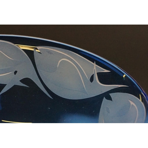 71 - Julia Linstead - Blue overlay studio glass bowl with engraved / etched fish decoration, raised on a ... 