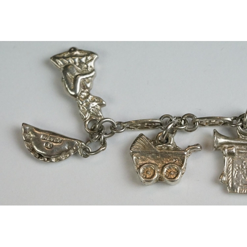 220 - A small collection of silver jewellery to include bangle, bracelet and brooches.