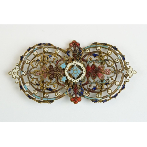 222 - An ornate brass two piece belt buckle with enamel decoration.