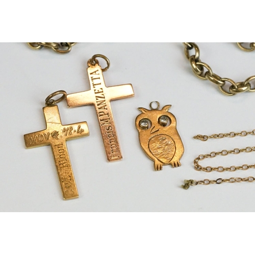 226 - A fully hallmarked 9ct gold owl pendant together with two yellow metal cross pendants and two chains... 