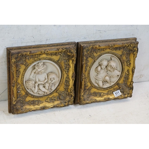 511 - Pair of Marble effect Plaster Plaques depicting children, 17cm diameter contained in ornate gilt fra... 