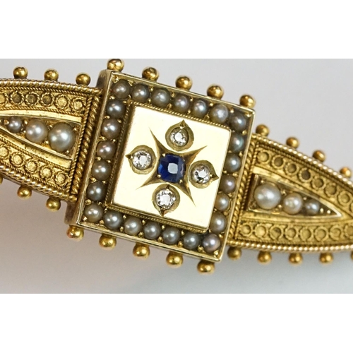 228 - An antique 15ct gold Victorian mourning brooch with filigree and seed pearl decoration and hair pane... 