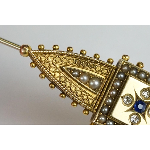 228 - An antique 15ct gold Victorian mourning brooch with filigree and seed pearl decoration and hair pane... 