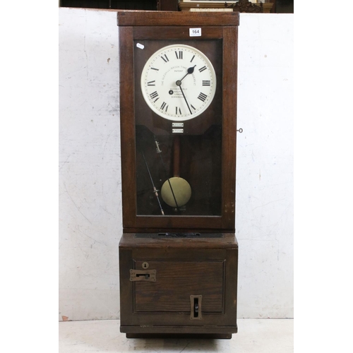 164 - Early-to-mid 20th century ' The Gledhill-Brook Time Recorders Ltd ' oak cased clocking-in clock, wit... 