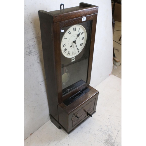 164 - Early-to-mid 20th century ' The Gledhill-Brook Time Recorders Ltd ' oak cased clocking-in clock, wit... 