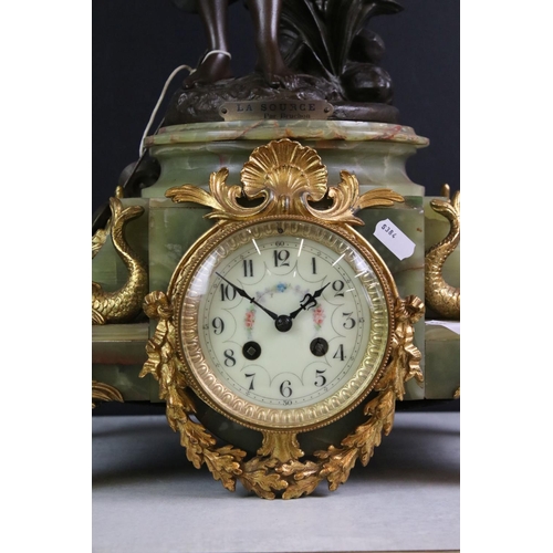 183 - Early 20th Century French onyx clock with applied gilt metal dolphins, the ivorine dial with black A... 