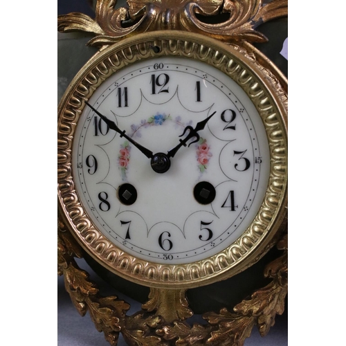 183 - Early 20th Century French onyx clock with applied gilt metal dolphins, the ivorine dial with black A... 