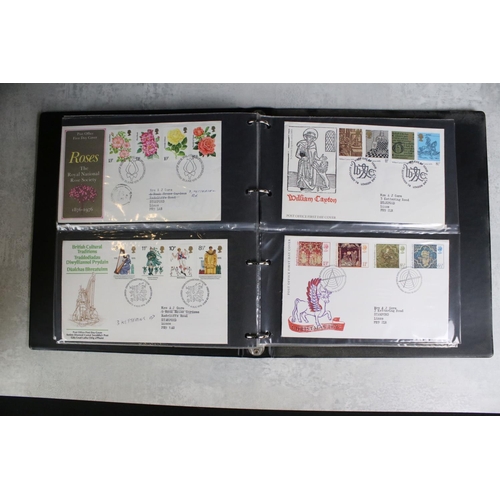 443 - A collection of British first day covers and stamp presentation packs to include miniature sheets.