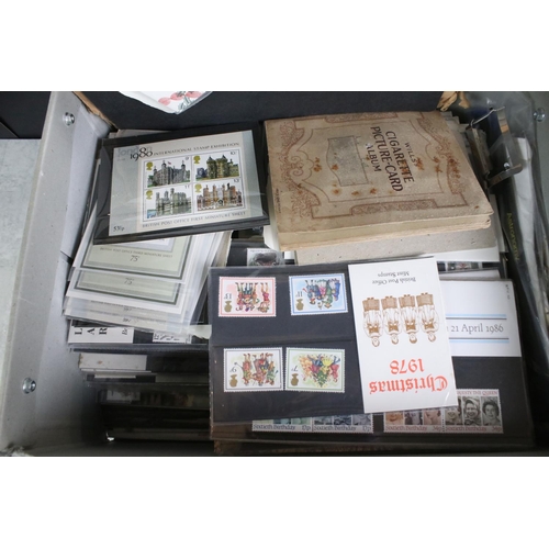 443 - A collection of British first day covers and stamp presentation packs to include miniature sheets.