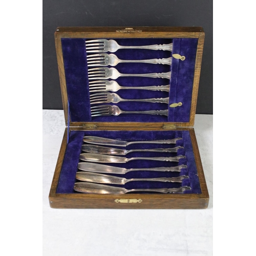 379 - Victorian Cased Set of Four Silver Plated Napkin Rings together with various cased sets of cutlery a... 