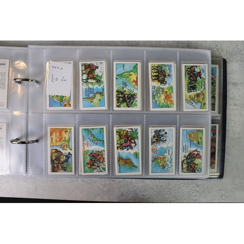 411 - A large collection of cigarette cards contained within twelve albums, full sets and part sets, date ... 