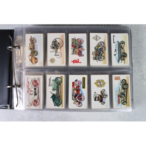 411 - A large collection of cigarette cards contained within twelve albums, full sets and part sets, date ... 