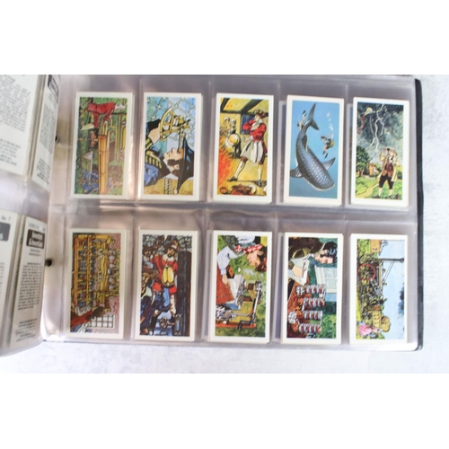 411 - A large collection of cigarette cards contained within twelve albums, full sets and part sets, date ... 