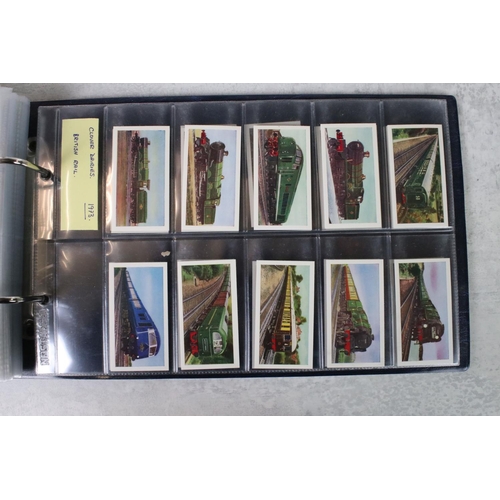 411 - A large collection of cigarette cards contained within twelve albums, full sets and part sets, date ... 