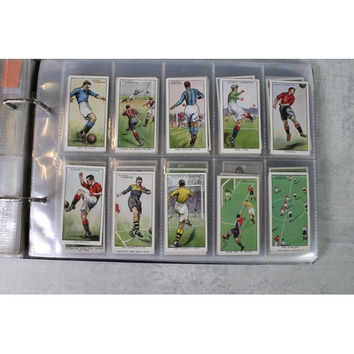 411 - A large collection of cigarette cards contained within twelve albums, full sets and part sets, date ... 