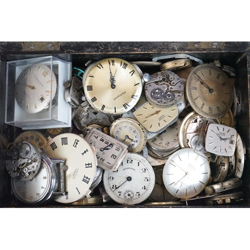 297 - Watchmakers and repairers parts, to include movements, dials, various spares featuring winders, pock... 