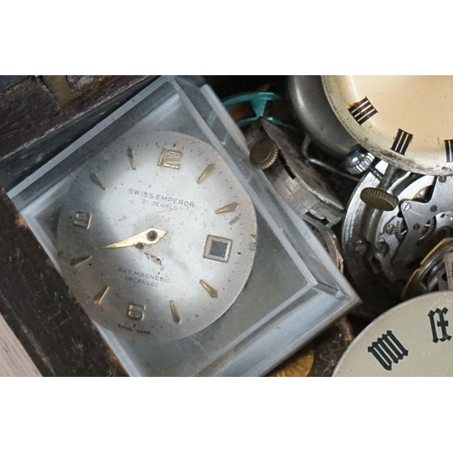 297 - Watchmakers and repairers parts, to include movements, dials, various spares featuring winders, pock... 