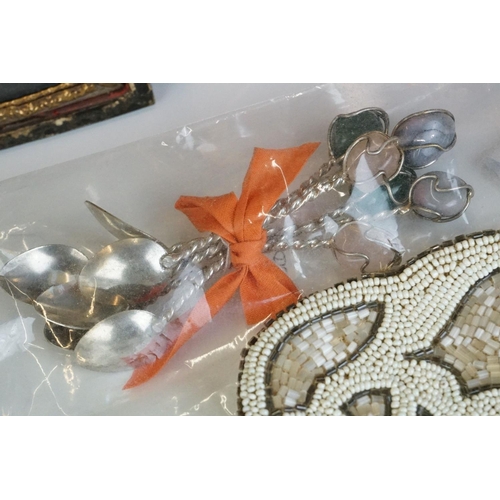 332 - A box of mixed collectables to include beaded purse, antique photographs, silver belt buckle with Re... 