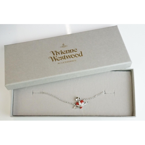 335 - A collection of Vivienne Westwood Jewellery to include Brooches and Necklaces contained within origi... 