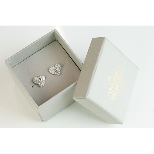 335 - A collection of Vivienne Westwood Jewellery to include Brooches and Necklaces contained within origi... 