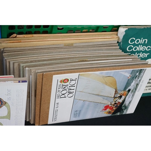 445 - A large collection of stamps, coins, cigarette cards, tea cards and first day covers contained in tw... 