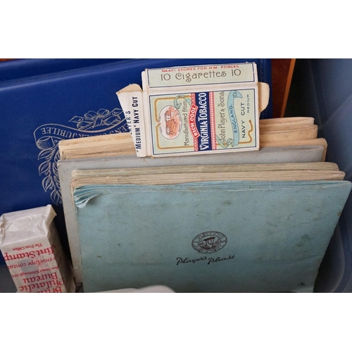 445 - A large collection of stamps, coins, cigarette cards, tea cards and first day covers contained in tw... 