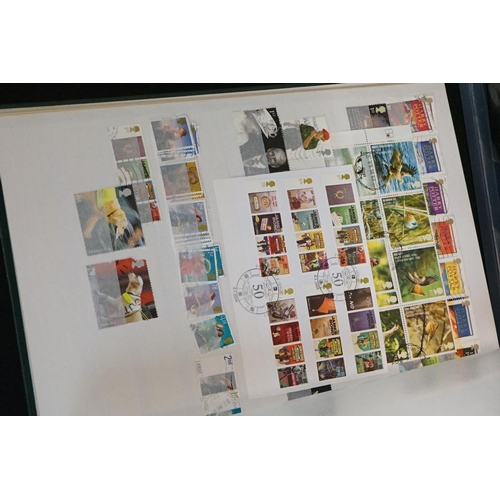 448 - A large collection of mainly British and commonwealth stamps contained within over ten albums togeth... 