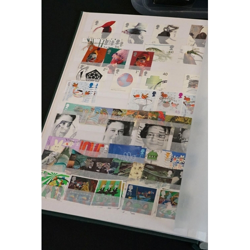 448 - A large collection of mainly British and commonwealth stamps contained within over ten albums togeth... 