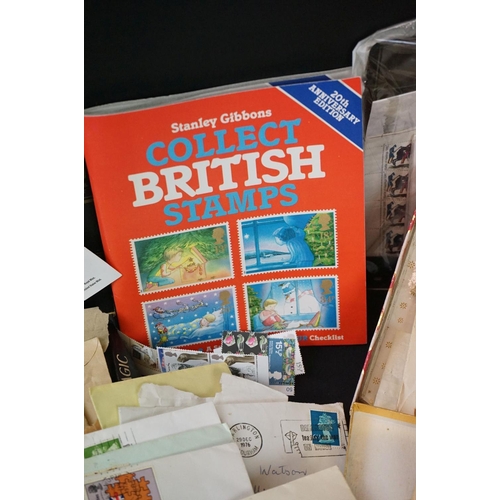 451 - A small collection of British and world stamps to include mint examples.