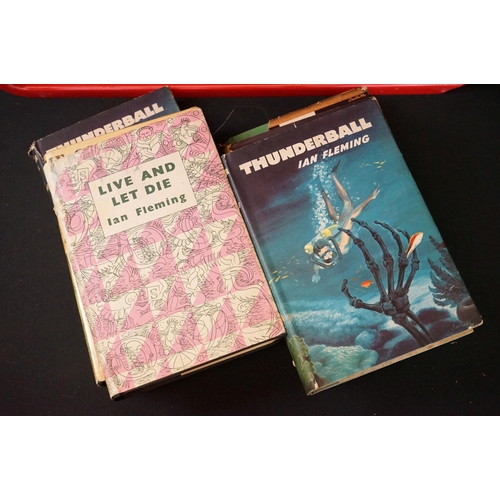 456 - A collection of approx twenty four Ian Fleming James Bond books, most with dust jackets, to include ... 