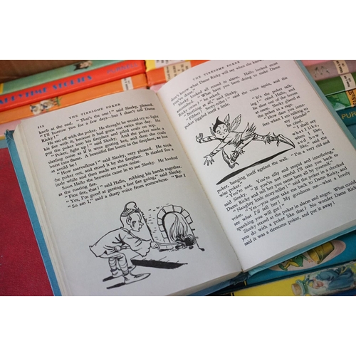 459 - A large collection of Enid Blyton board back books, approx thirty two in total dating from the 1960'... 