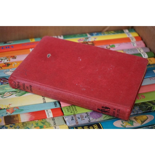 459 - A large collection of Enid Blyton board back books, approx thirty two in total dating from the 1960'... 